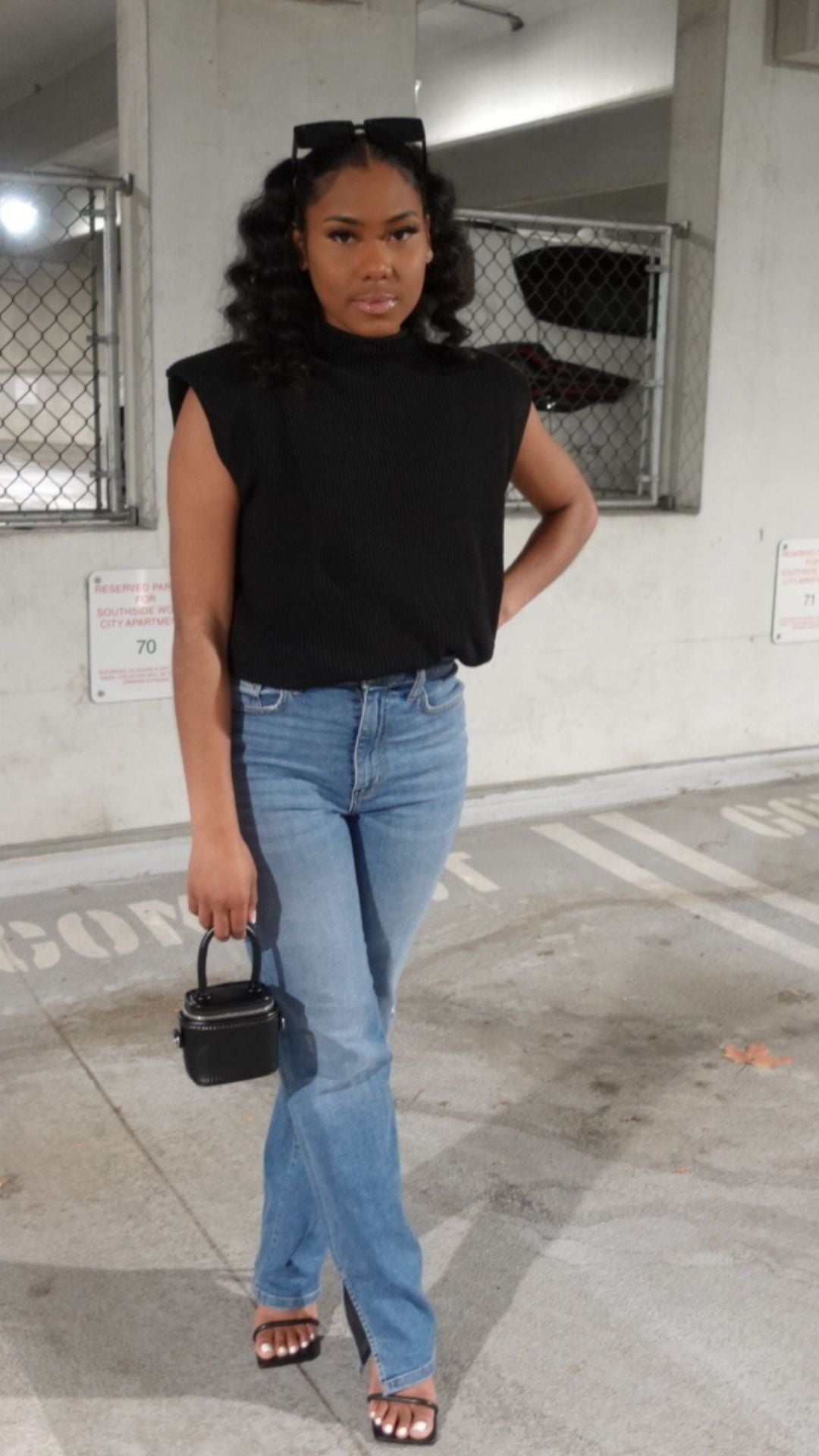 Sleeveless High Collar Sweater